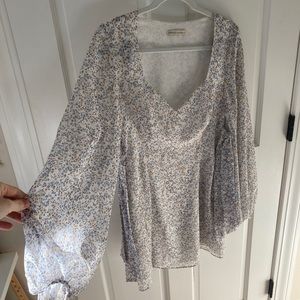 Floral mini dress with ties on sides